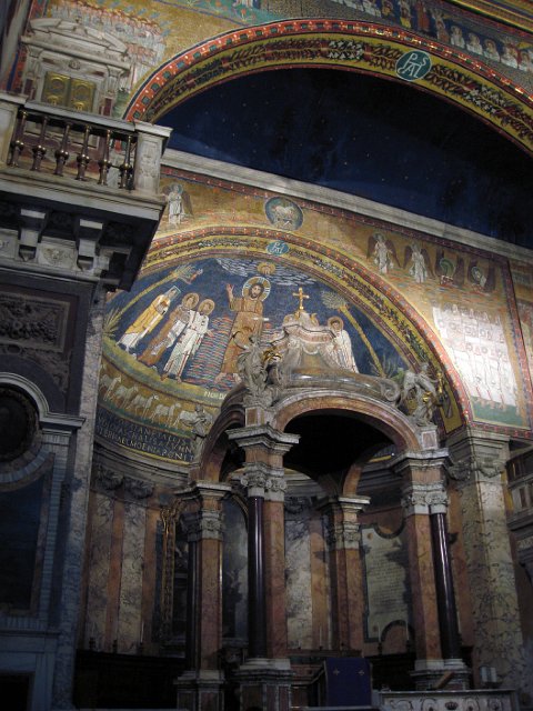 Basilica di San Prassede-8.JPG - The rich mosaics of the apse date from the 9th century and feature Christ in the centre of the semi-dome, surrounded by St. Peter, St. Pudentiana and St. Zeno (to the right) and St. Paul, St. Praxedes and St. Paschal (to the left).
